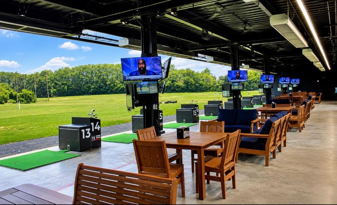 Numbered hitting stations inside The Bays at Fairways at GLC